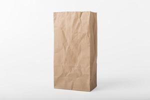 Blank brown paper bag for mockup template advertising and branding background. photo