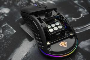 09 October 2021- Bucharest, Romania. The gaming mouse Genesis Xenon 800 with it's interior displayed photo