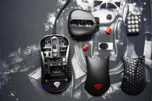 09 October 2021- Bucharest, Romania. The gaming mouse Genesis Xenon 800 with it's interior displayed photo