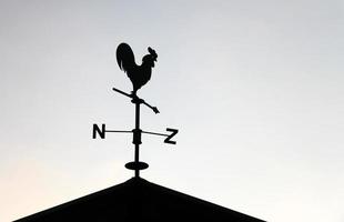 Black weathervane in the form of a rooster