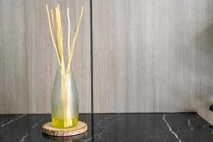Aromatic reed freshener on table photo