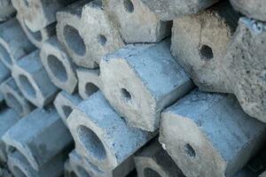 Close up cross-sectional area of stacked of concrete pile stake photo