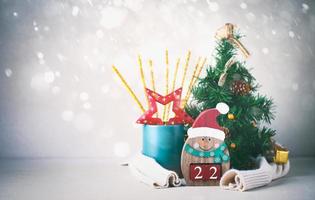 Snowman with number of new year photo
