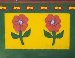 GUATAPE, COLOMBIA, SEPTEMBER 11, 2019 - Detail from colorful facade on the building in Guatape, Colombia. Each building in town Guatape has bright color tiles along the lower part of facade. photo