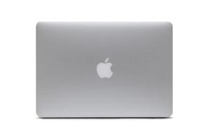 BELGRADE, SERBIA, MARCH 3, 2017 - MacBook computer isolated on white. The MacBook is a brand of notebook computers manufactured by Apple Inc. photo