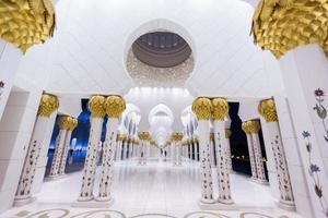 ABU DHABI, UAE, MAY 4, 2015 - Interior of Sheikh Zayed Mosque in Abu Dhabi. Mosque was designed by Yusef Abdelki and opened at 2007. photo