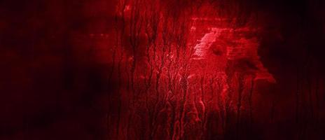 Scary Red and black horror background. Dark grunge red concrete photo