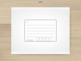 Shipping parcel tied with area for write address on wood background. White paper envelope for online delivery. Vector. vector