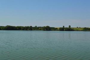 Panorama of the river in the countryside in summer photo