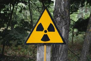 Orange symbol of radioactivity in the Chernobyl exclusion zone in Ukraine photo