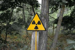 Orange symbol of radioactivity in the Chernobyl exclusion zone in Ukraine