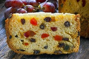 panettone con frutas pastel de navidad italiano foto