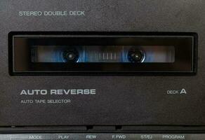 Close up front a deck recorder of the vintage stereo cassette tape player