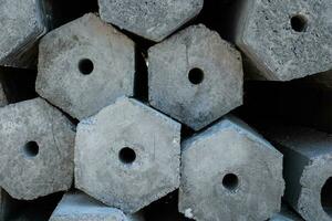 Close up cross-sectional area of stacked of concrete pile stake photo