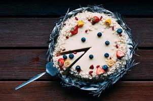 Top view round white chocolate cake photo