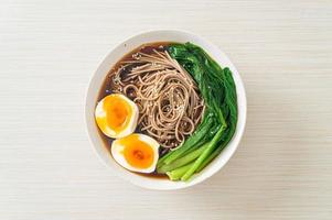 ramen noodles with egg - vegan or vegetarian food style photo