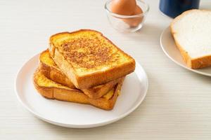 french toast on white plate photo