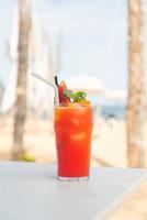 fruit punch with sea beach background photo