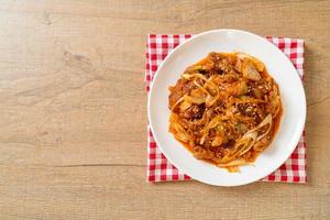 stir-fried pork with Korean spicy paste and kimchi photo