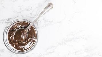 flat lay chocolate pudding bowl photo