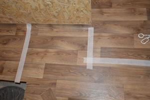 Laying industrial linoleum in the interior of the house photo