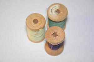 Spools of thread for sewing clothes close-up photo
