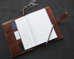 Brown leather notebook photo