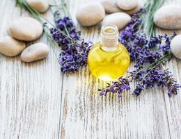 Lavender oil and lavender flowers photo