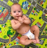 Beautiful baby boy with child face posing photographer photo