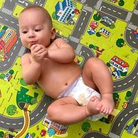 Beautiful baby boy with child face posing photographer photo