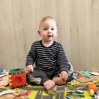 Beautiful baby boy with child face posing photographer photo