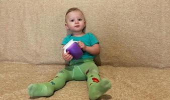 Beautiful baby boy with child face posing photographer photo