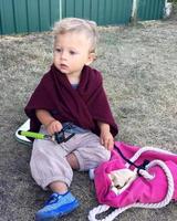 Beautiful baby boy with child face posing photographer photo