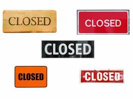 Closed signs isolated over white photo