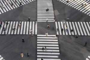 TOKYO, JAPAN, OCTOBER 12, 2016 - Unidentified people crossing the busy street in Ginza, Tokyo.It is a popular upscale shopping area of Tokyo. photo