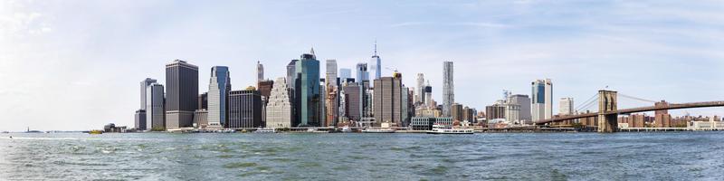 NEW YORK, USA, AUGUST 27, 2017 -  View at Brooklyn bridge in New York. It is a hybrid bridge with approximately 4000 pedestrians and 3000 cyclists cross this historic bridge each day. photo