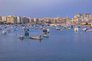 VALLETTA, MALTA, SEPTEMBER 9, 2017 - View at Valletta port at Malta. Port of Valletta is the largest natural harbor in Europe photo