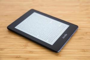 BELGRADE, SERBIA, JANUARY 16, 2019 - Amazon Kindle ebook reader in Belgrade, Serbia. It s a serie of e-readers designed and marketed by Amazon. photo