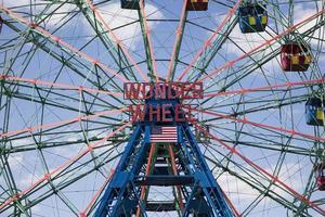 NEW YORK, USA, AUGUST 23, 2017 - Unidentified people at Luna Park in Coney island, New York. Luna Park is opened in 2010 former site of Astroland. photo