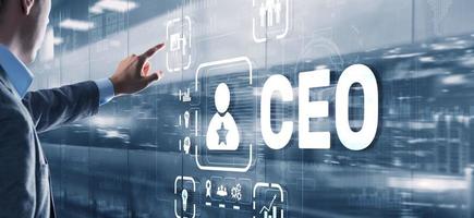 CEO concept. Businessman pressing virtual screen inscription boss photo