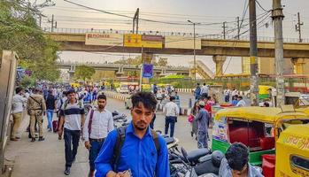 New Delhi Delhi India 2018 - Big traffic Tuk Tuks buses people New-Delhi Delhi India. photo