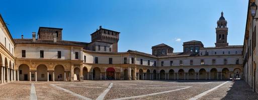 Panoramic view of a medieval square and entrance to the palace photo