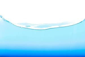 Level water and air bubbles over white background photo