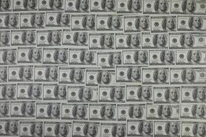 Group of money stack of 100 US dollars banknotes a lot of is arranged in a beautiful photo