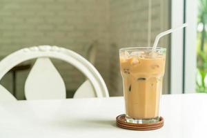 iced latte coffee glass on table photo