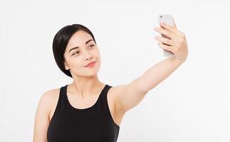 sexy, pretty asian,korean woman taking a selfie isolated on white background,copy space,mock up photo