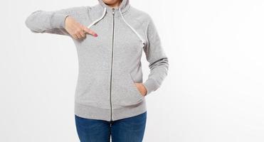 pointed asian woman in gray pullover hoodie mockup cropped image photo
