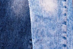 Textura de mezclilla de cerca de fondo, azul y textura de jeans azul oscuro foto