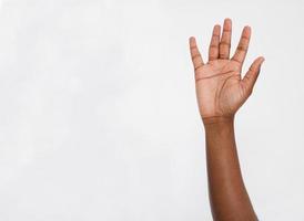 Black hand isolated on white.Voting hand. Mock up. Copy space. Template. Blank. photo