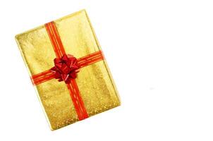 Gold gift box with red ribbon for christmas decoration with Clipping Paths photo